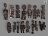 many wooden figurines of different shapes and sizes