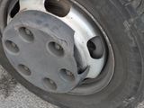 a close up of a flat tire on a car