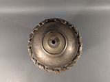 a metal object that is sitting in the sink