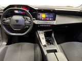 a picture of a car dashboard with a steering wheel and dashboard controls