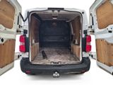 a white van with two open doors on the back of it