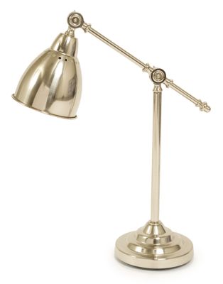 an image of a brass desk lamp on a white background