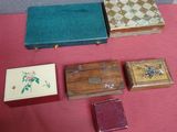 a lot of small boxes that are on a pink table
