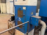 a blue machine that is sitting in a building