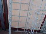 a metal rack that is next to a door