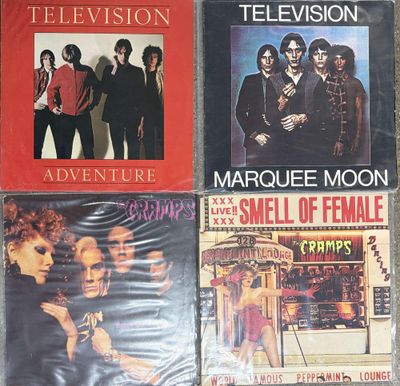 three television dvds are sitting on a table next to each other