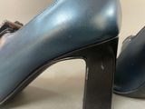 a close up of a pair of high heeled shoes