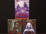 three vampire books are stacked on top of each other on a black background