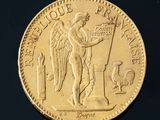 an image of a gold coin with an angel on it