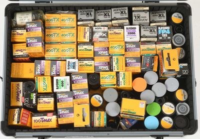 a black case filled with many different types of film