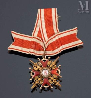 une image représentant un ruban rouge et blanc orné d'une étoile dorée