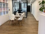 an image of a room with a lot of tables and chairs