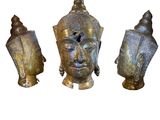 three statues of buddhas are shown on a white background
