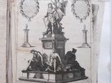 an old book with a picture of a statue on it