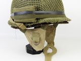 an old military helmet with a visor on a white background