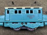 a toy train that is sitting on the ground