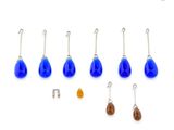 a close up of a group of fishing hooks and hooks