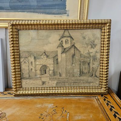 a picture of a picture of a church on a desk
