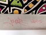 a bag with a design on it sitting on a table