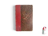 a book with a red cover sitting on a white surface