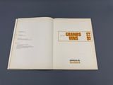 an open book with a picture of a baseball player on it
