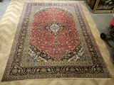 an image of a large oriental rug on the floor in a room