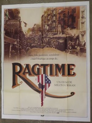 the poster for the movie ragtime is hanging on the wall