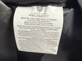 a close up of a label on a black leather jacket