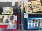 a lot of stamps on the inside of a binder