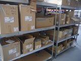 boxes are stacked on a shelf in a warehouse with a lot of them