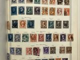 an open book with a bunch of different stamps on it
