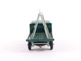 a toy truck that is sitting on a white surface