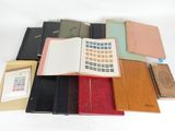 a lot of books and a calculator on the table