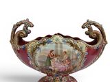 a vase that has a picture of a woman on it