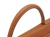 the brown leather briefcase is open and ready to be used