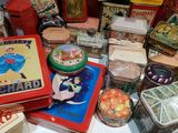 many different tins on the table with a variety of tins