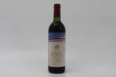 a bottle of wine that is sitting on a table