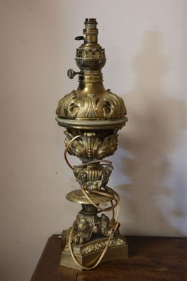 a lamp that is on top of a wooden table