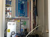 a cabinet that has a bunch of wires in it