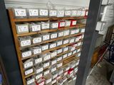 many boxes on the shelves in the garage