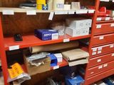 many boxes and boxes on the shelves in the room