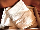 a box that has a bunch of folded towels in it