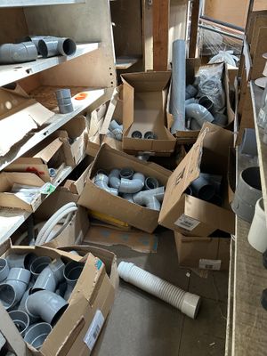 many boxes of items that are sitting on the floor
