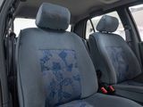 a picture of a car with blue seats in the back