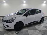the white car is parked on a checkered floor in the garage