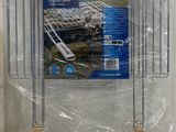 a picture of a metal rack that is wrapped in plastic