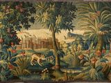 an image of a tapestry hanging on the wall of a room