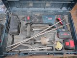 a tool box with tools in it sitting on a table