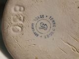 a close up view of a vase with a lid