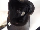 a hat that is sitting on a table next to a bag
